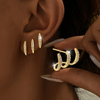 Elegantes pendientes de tres garras con pedrería